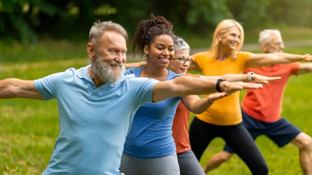Adults participating in wellness activities that support emotional health resilience and overall mental well-being